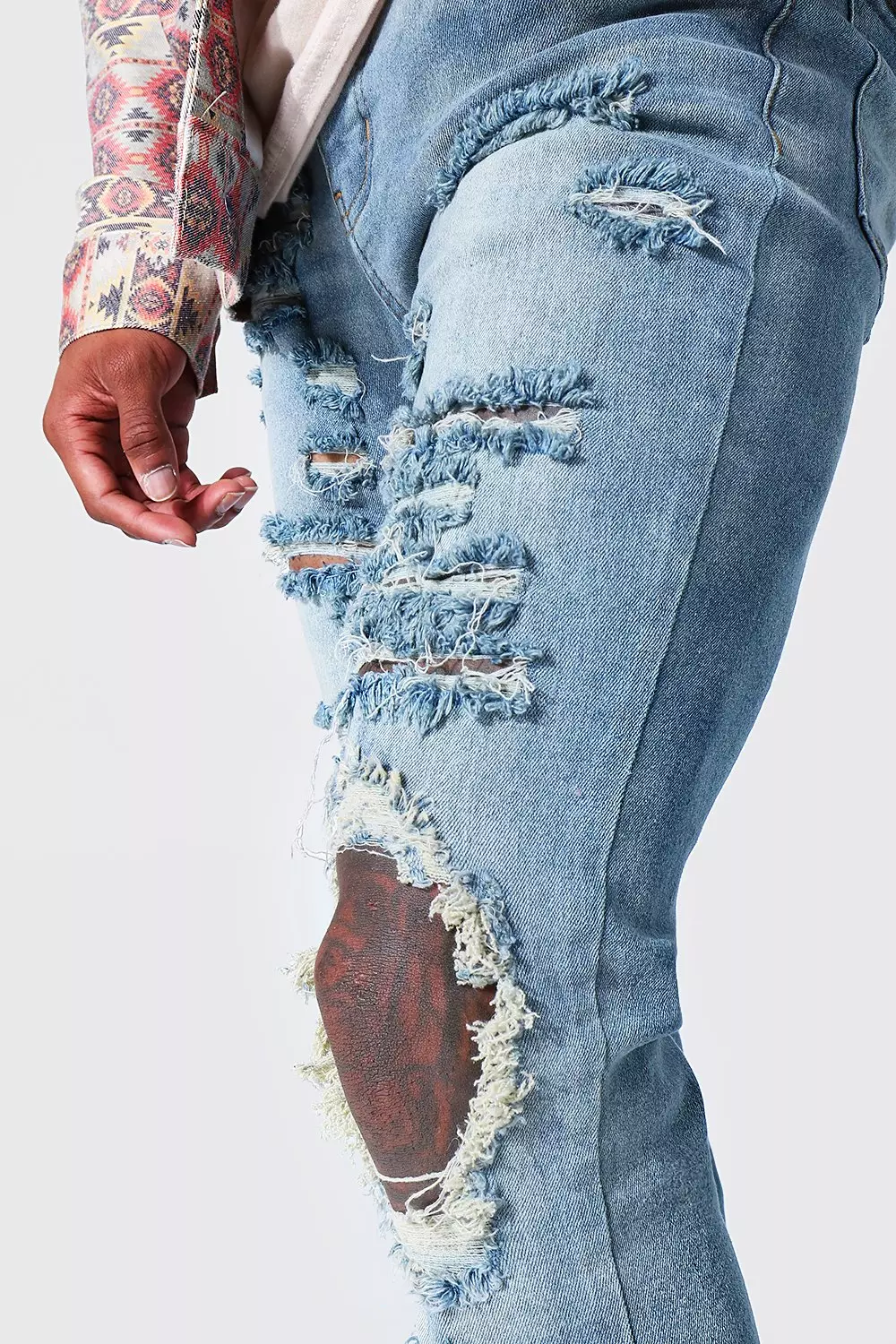 All over best sale ripped jeans